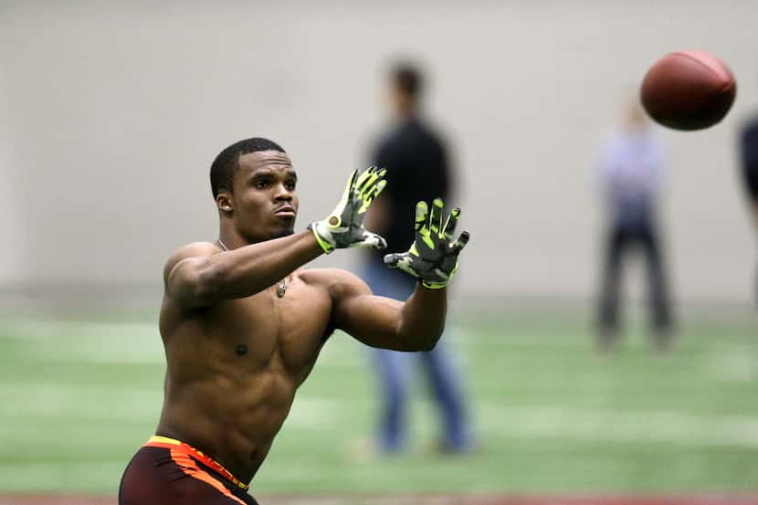 Former Texas A&M running back Trey Williams runs a drill during Texas A&M Pro Day at the...