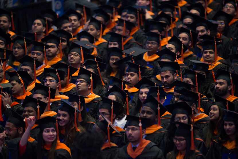 Masters students during a graduation ceremony for the University of Texas at Arlington's...