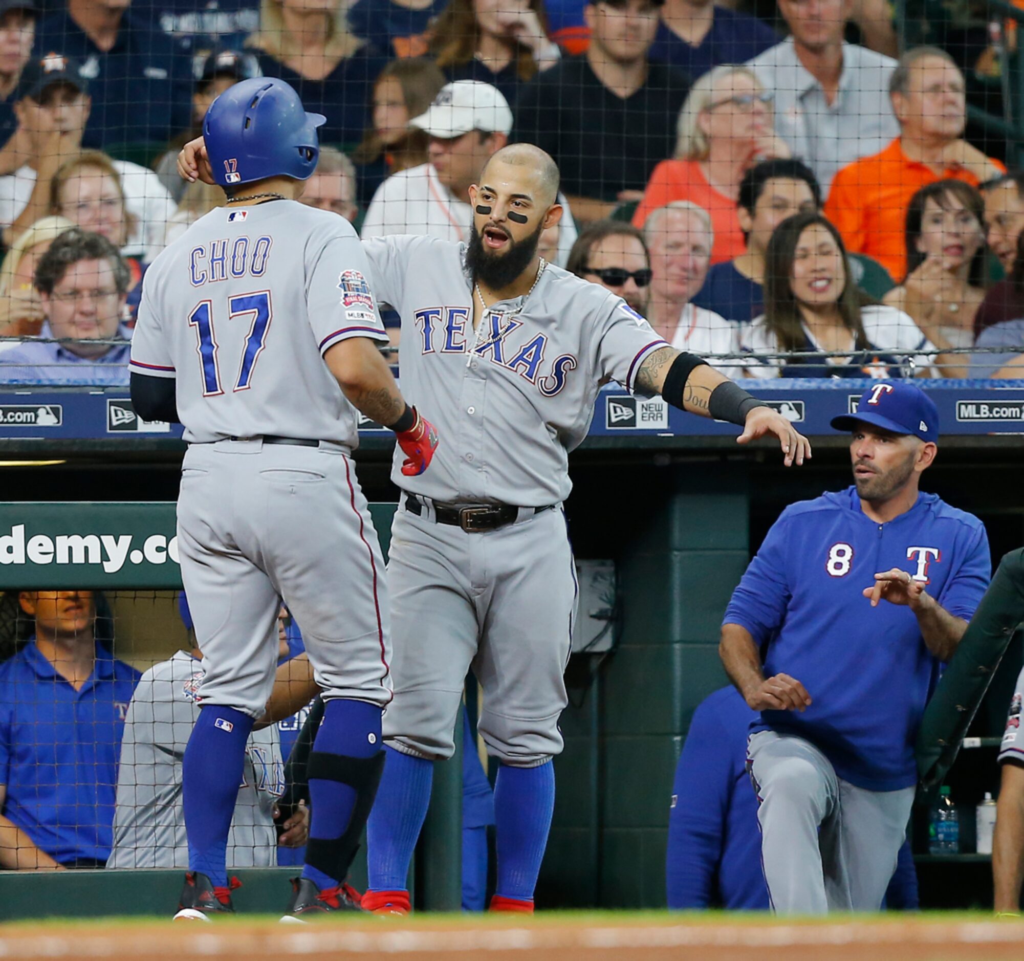 HOUSTON, TEXAS - JULY 20: Shin-Soo Choo #17 of the Texas Rangers is congratulated by Rougned...