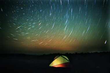 A tent under the Leonid meteor shower over Lambshead Ranch near Albany, north of Abilene....