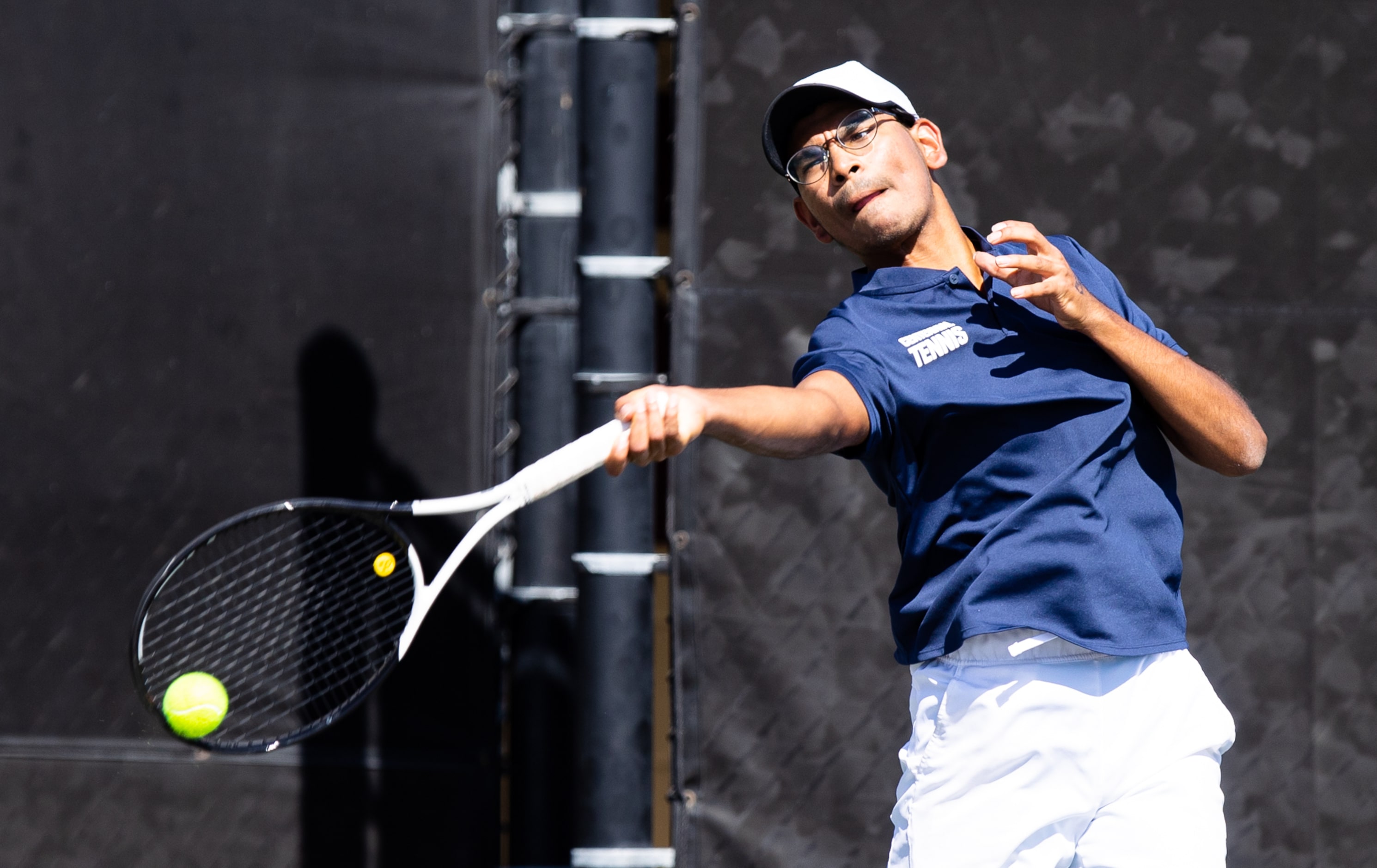 Frisco Centennial’s Tanish Gupt returns a shot during a doubles match with partner Rahul...