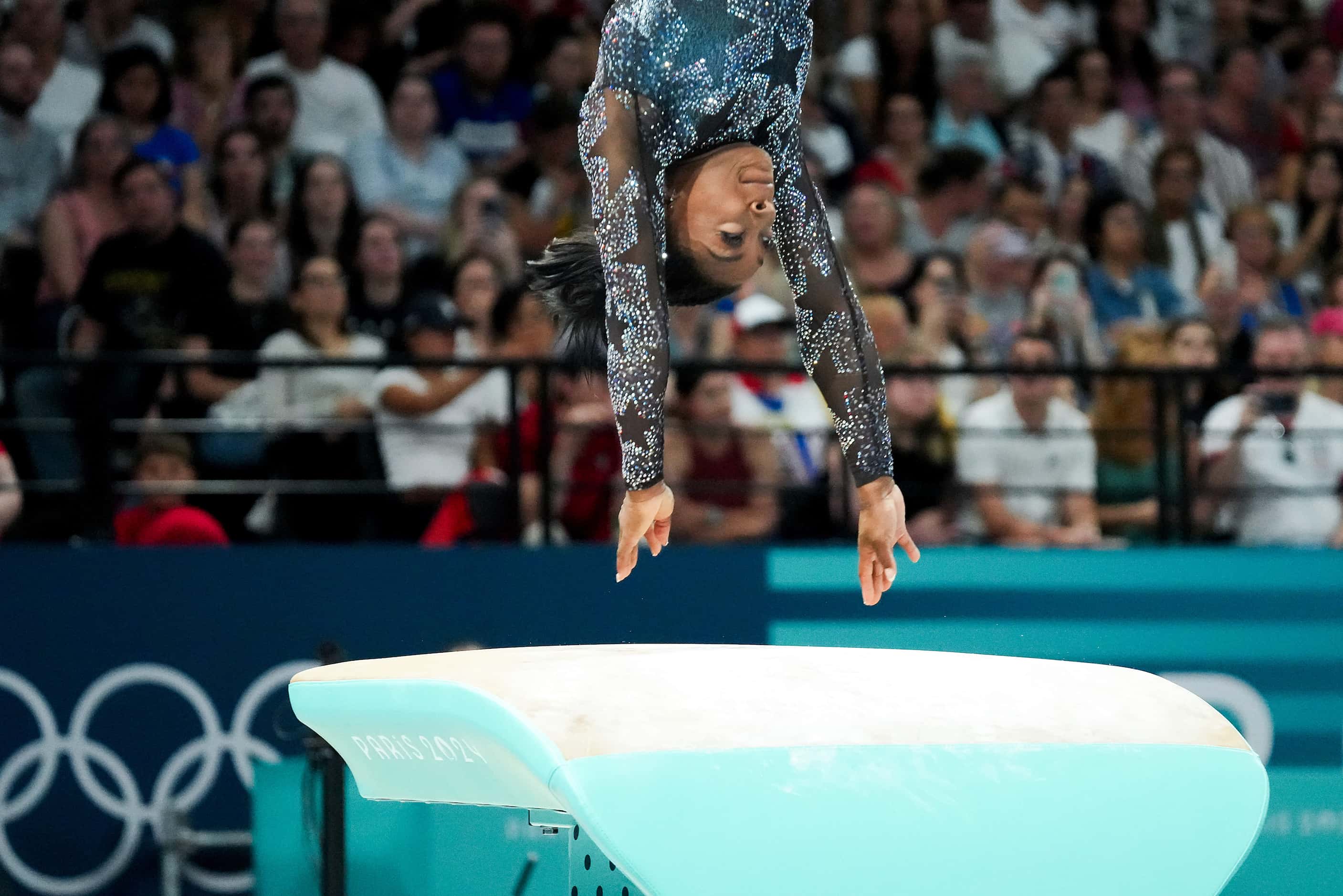 Simone Biles of the United States competes on the vault during women’s gymnastics qualifying...
