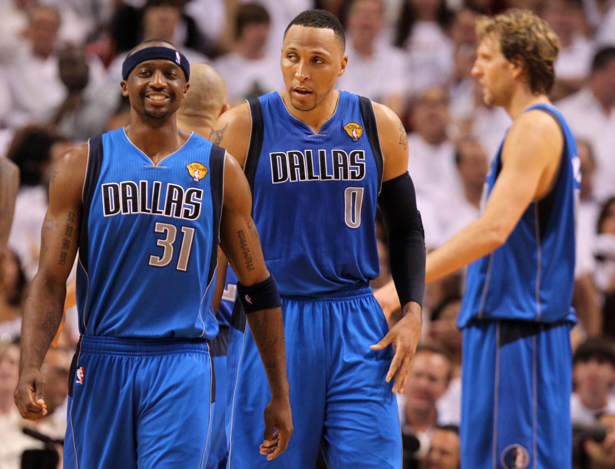 Dallas Mavericks shooting guard Jason Terry (31) smiles with Dallas Mavericks small forward...