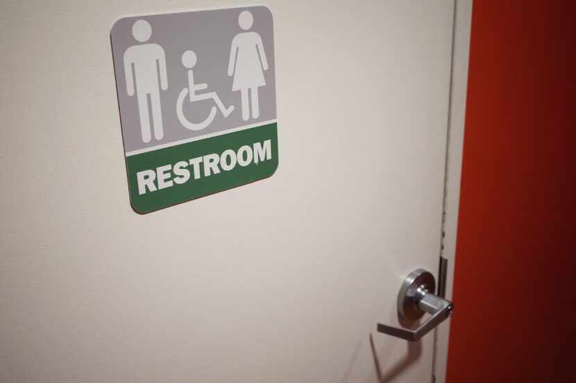 (FILES) This file photo taken on May 05, 2016 shows A gender neutral bathroom  in...