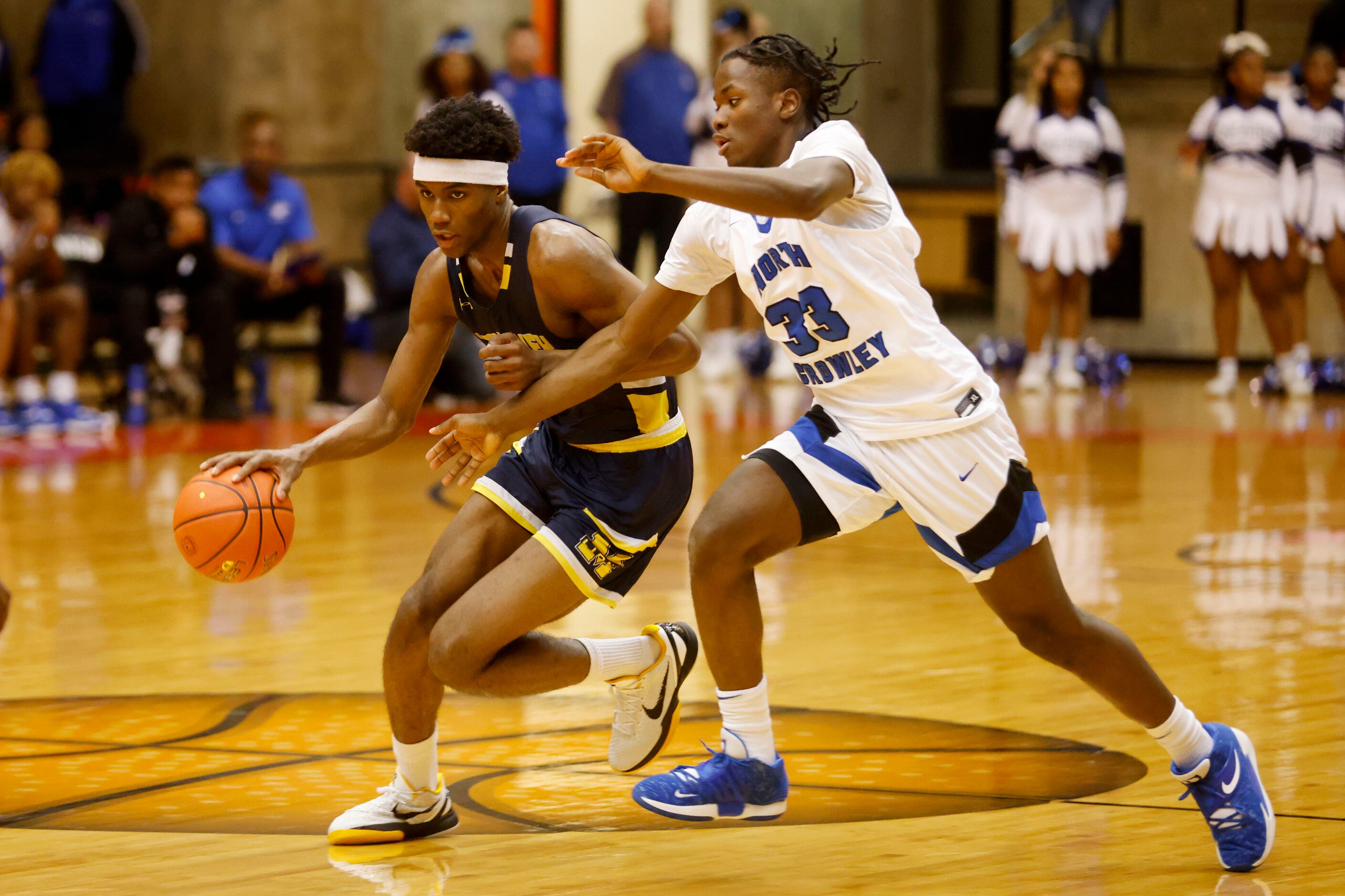 McKinney’s Ja'Kobe Walter (4) is chased by North Crowley’s Justin McCray (33) during the...