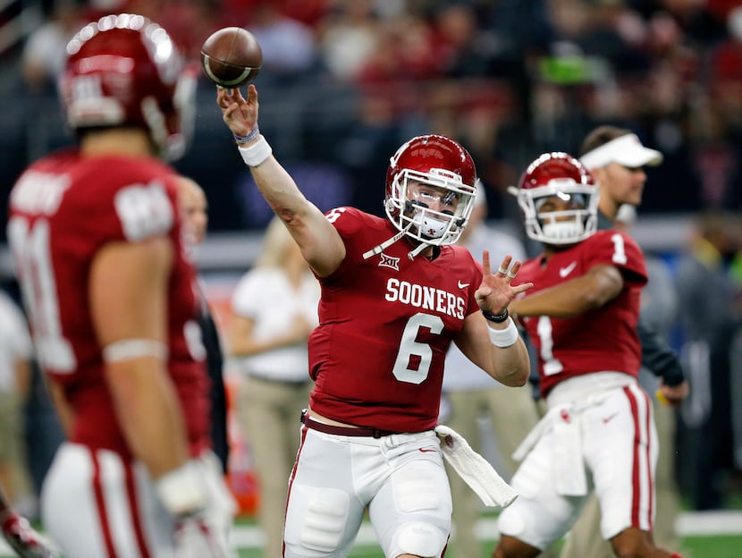 FILE - Oklahoma Sooners quarterback Baker Mayfield (6) warms up before their Big 12...