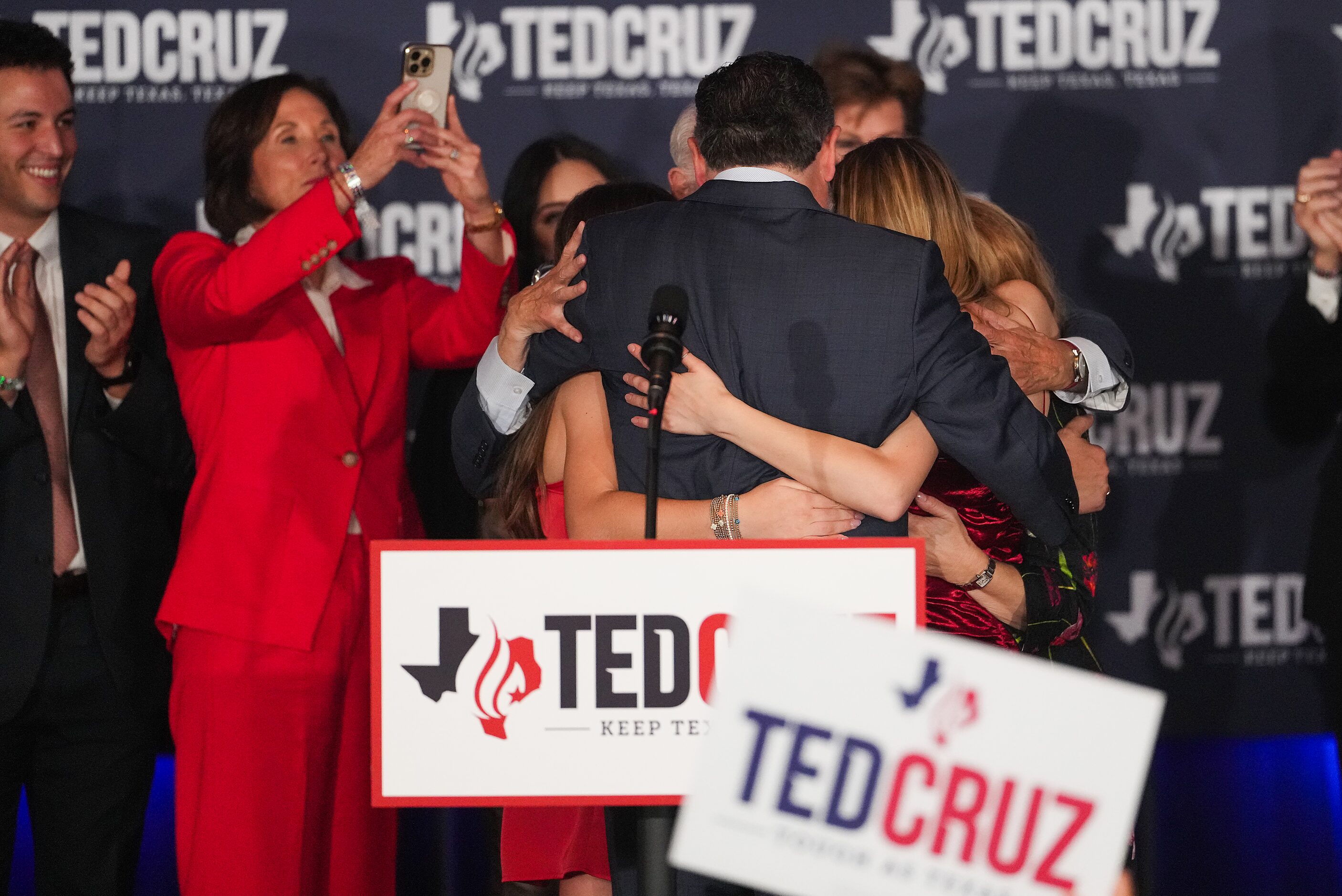 Sen. Ted Cruz, R-Texas, hugs his wife Heidi Cruz and daughters Caroline and Catherine during...