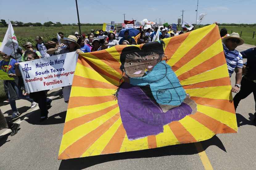 Marchers on their way to the immigrant detention center in Dilley, Texas.