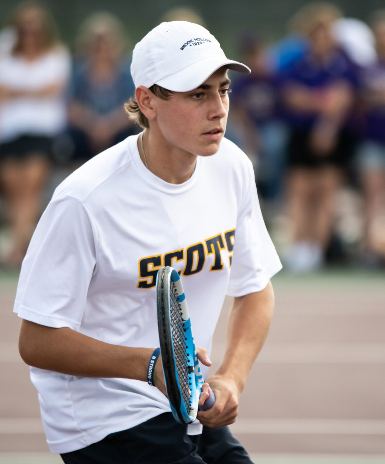 Highland Park's Ray Saalfield waits to return the ball in a doubles match with teammate...