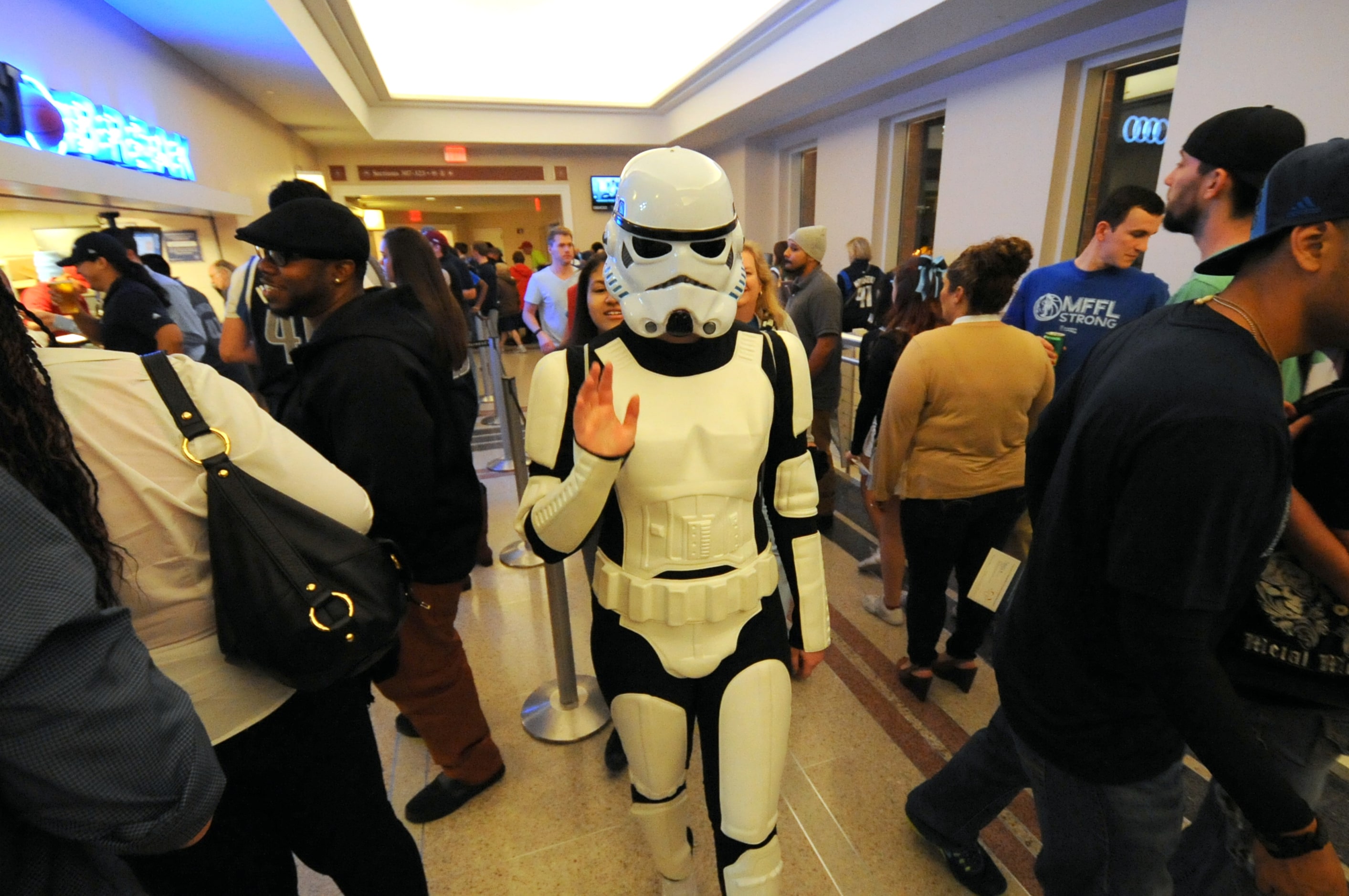 A storm trooper meets fans at Star Wars night at the Dallas Mavericks basketball game at...