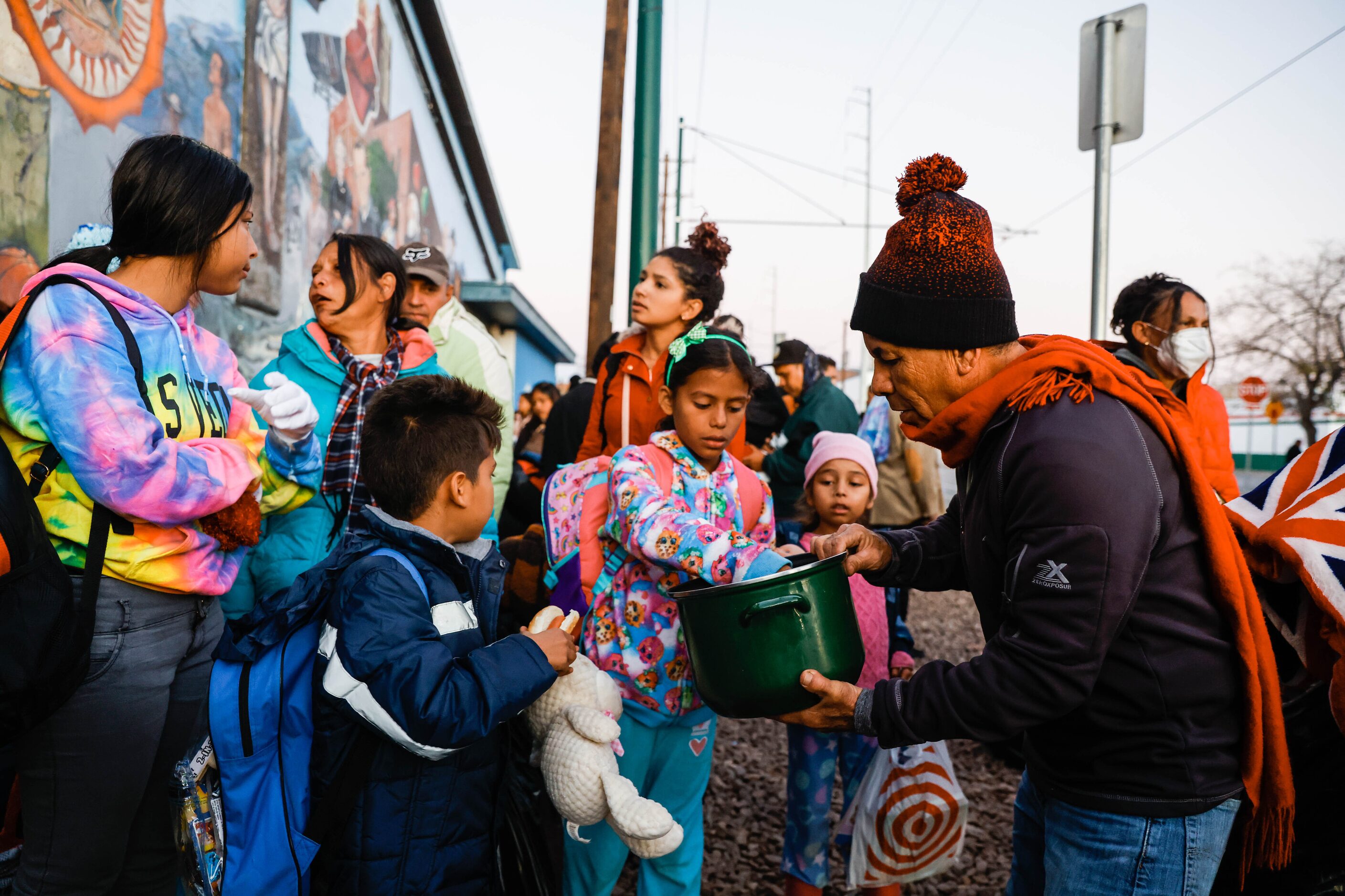 Jose Castañeda, from Xacatecas, Mexico but has lived in El Paso for 30 years, gives away...