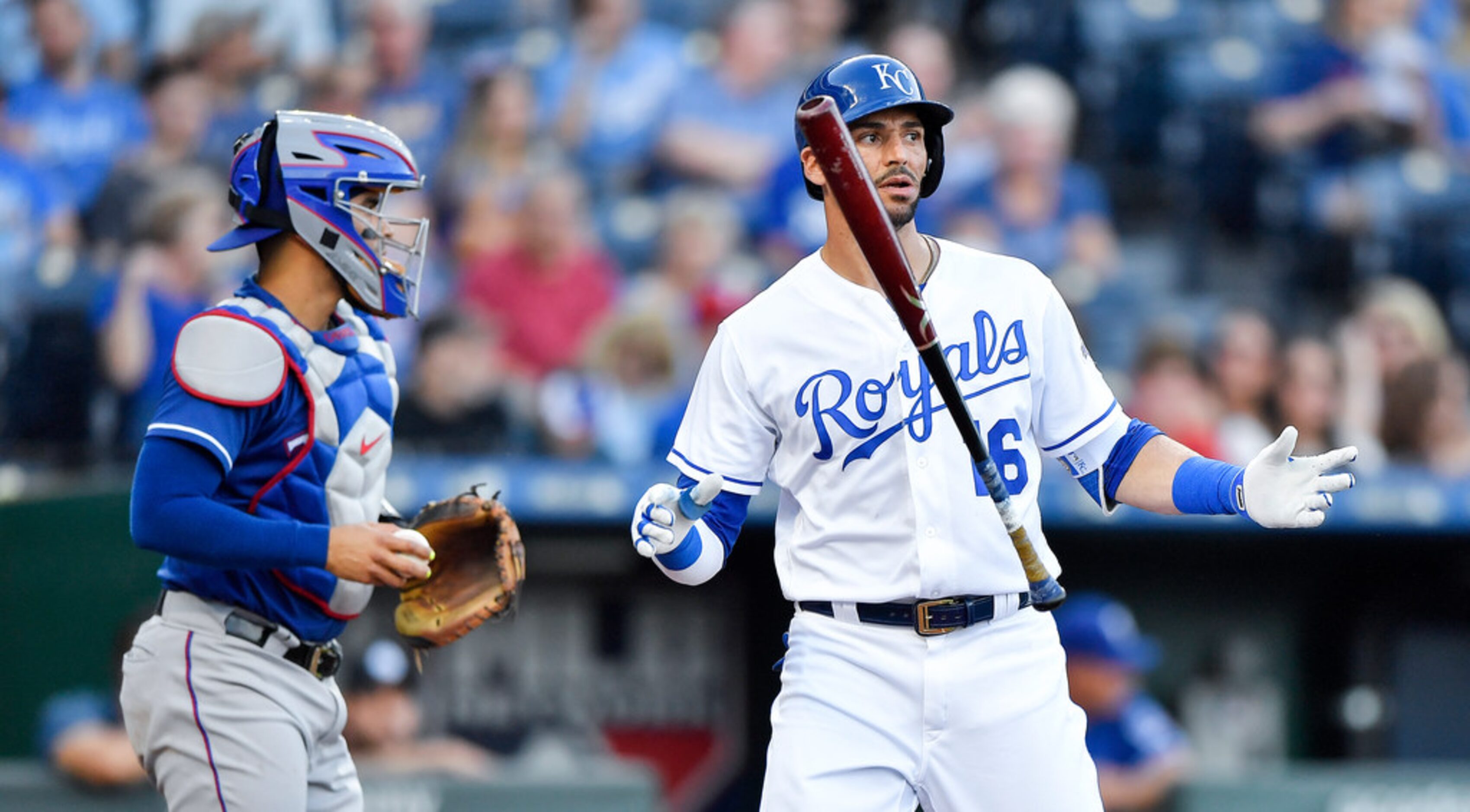 The Kansas City Royals' Paulo Orlando flips his bat around after striking out in the first...