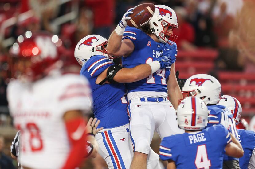 Southern Methodist Mustangs tight end Ryan Becker (14) celebrates a touchdown during a...