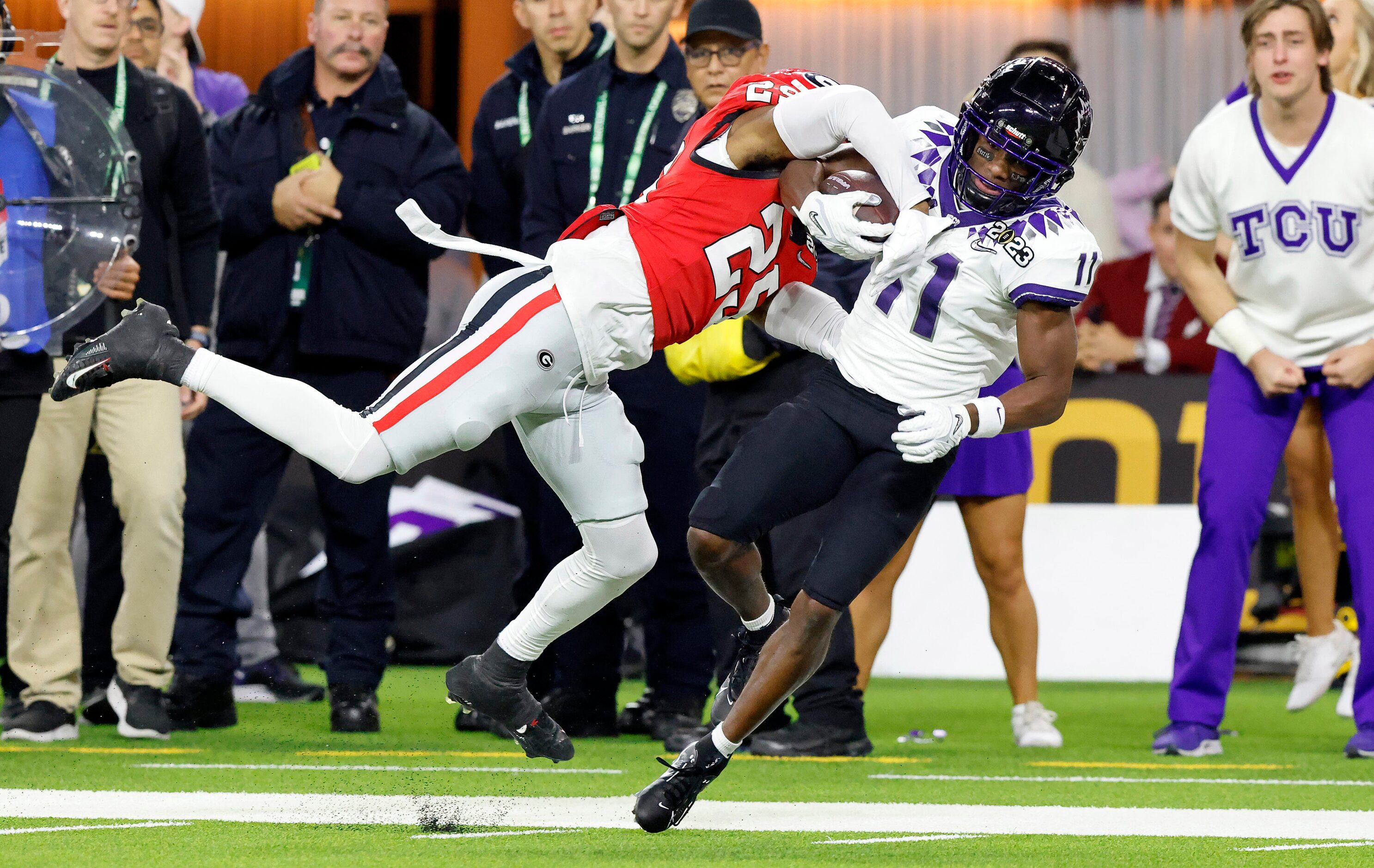 TCU Horned Frogs wide receiver Derius Davis (11) is tackled by Georgia Bulldogs linebacker...