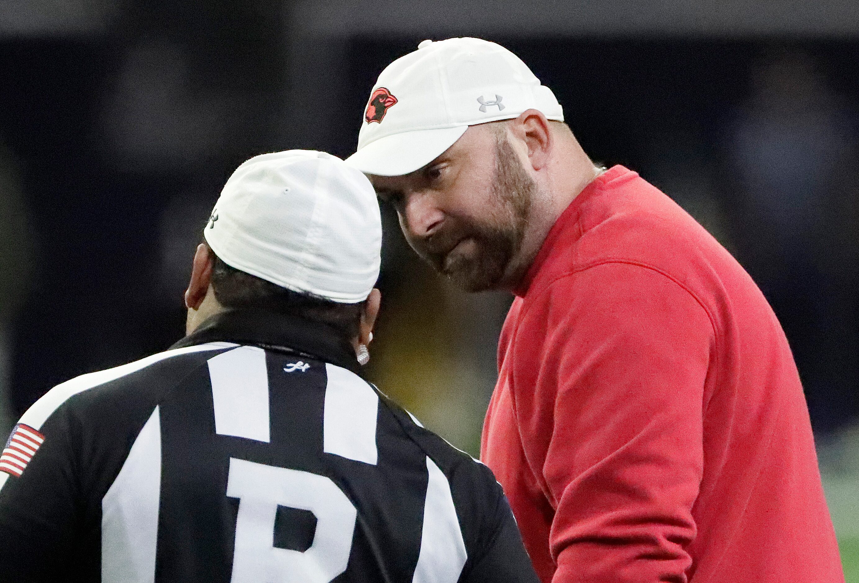 Melissa High School head coach Matt Nally questions a call during the first half as Melissa...