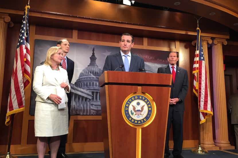  Sen. Ted Cruz, joined by (L to R) Sens. Kirsten Gillibrand, D-N.Y., Ron Wyden, D-Ore., and...