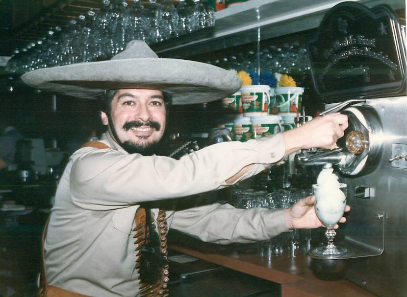 Mariano Martinez in 1991 with his frozen margarita machine at Mariano's in Old Town. 