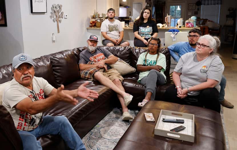 Francisco Esparza (from left) spoke to The Dallas Morning News with his neighbors, Nathan...