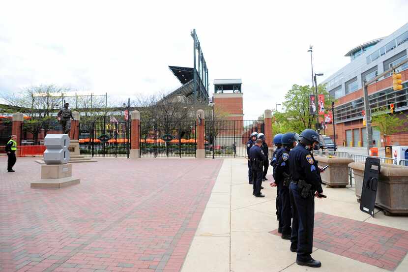 Apr 27, 2015; Baltimore, MD, USA; Baltimore police officers stand outside the stadium prior...