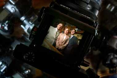 (1/28/03)  Ramsey and Mary Jabbour and thier son Eugene at their family run photo store,...