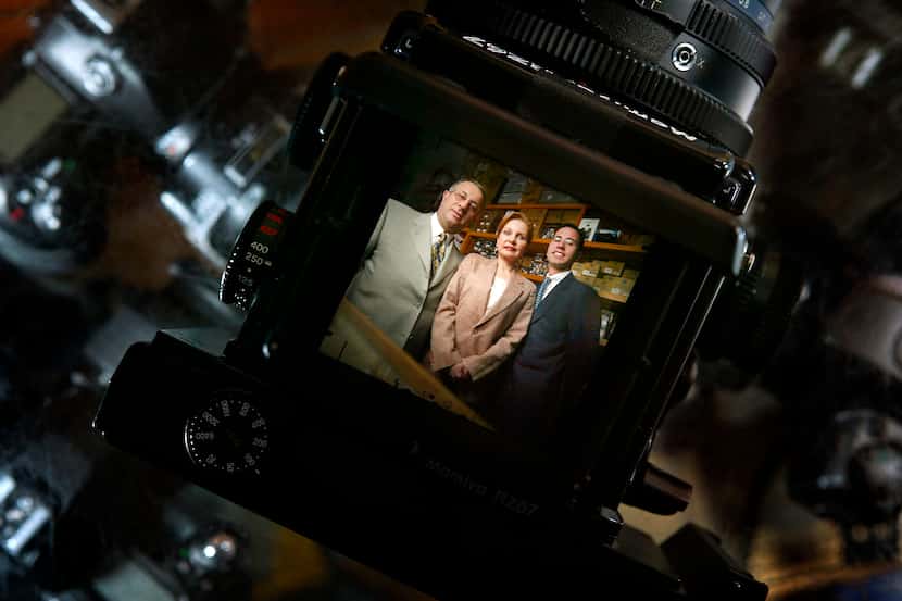 (1/28/03)  Ramsey and Mary Jabbour and thier son Eugene at their family run photo store,...