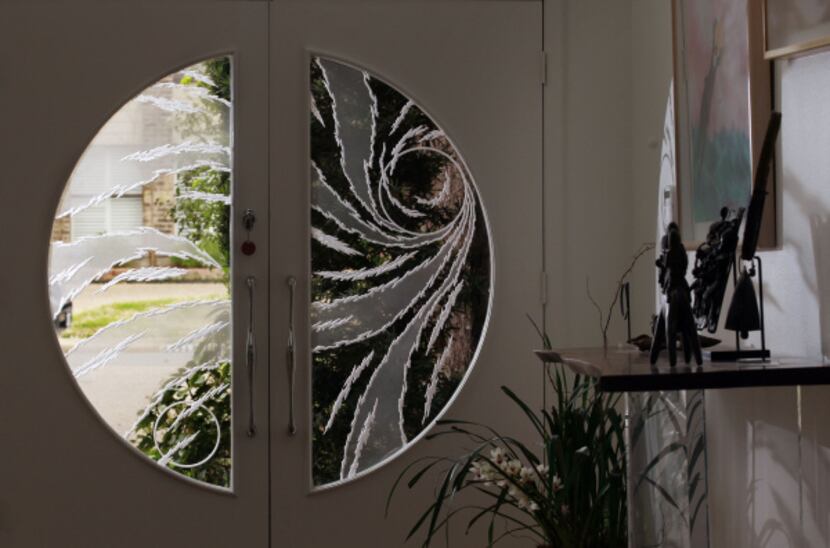 Veronique Jonas designed the etched-glass panels in the front doors.