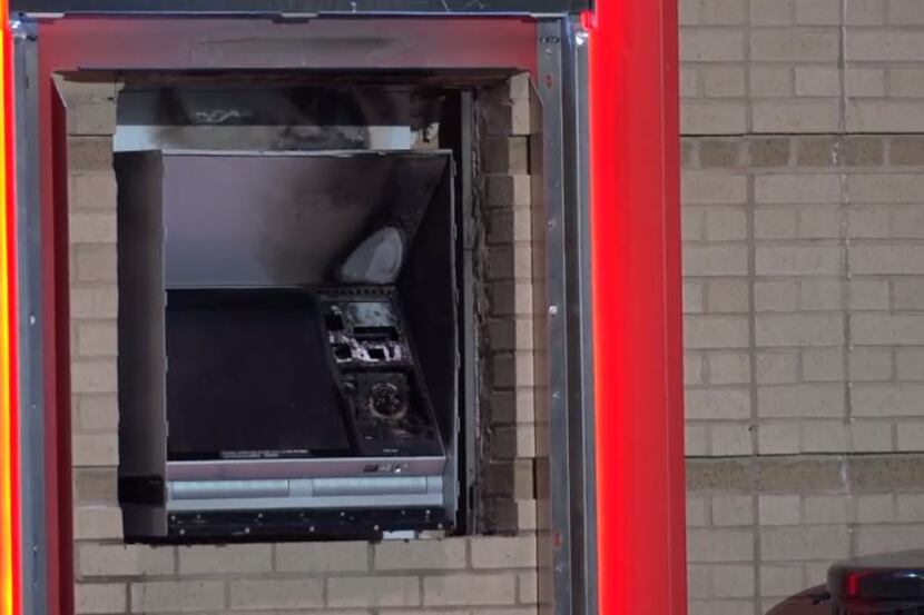 An ATM was damaged in a fire that police believe was intentionally set Wednesday morning in...