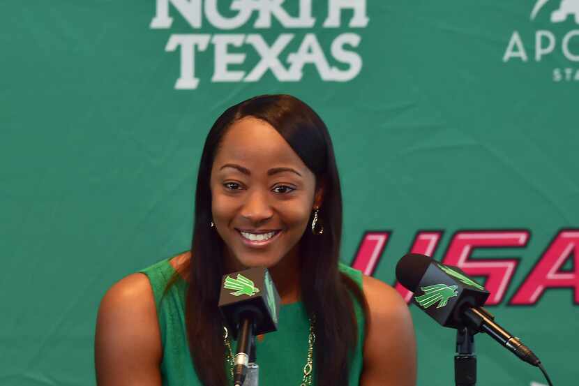 New UNT head women's basketball coach Jalie Mitchell answers questions at the press...
