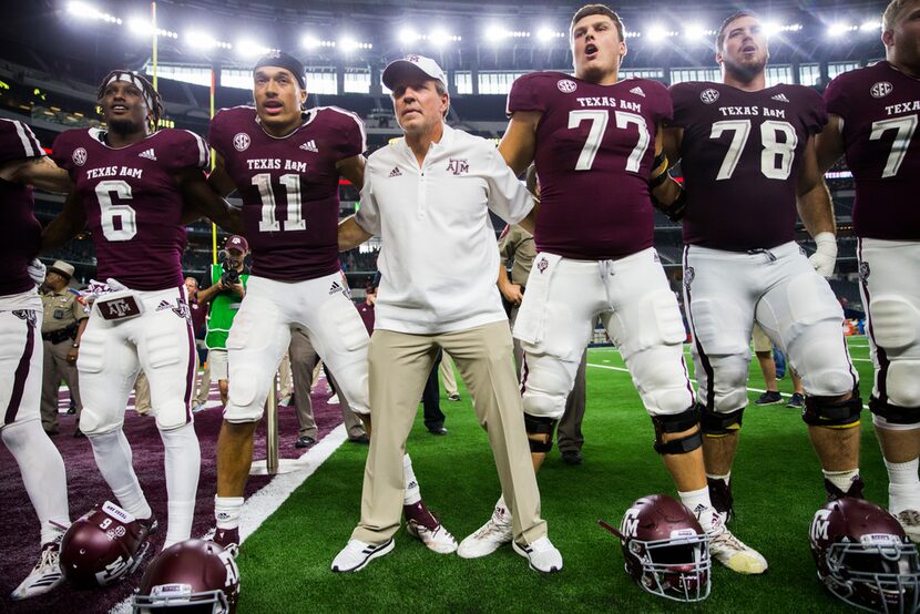 FILE - Texas A&M Aggies head coach Jimbo Fisher and the Texas A&M Aggies sing the Aggie War...