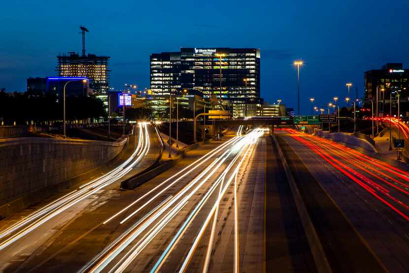  A long exposure shows traffic on the Dallas North Tollway at Tennyson Parkway with Legacy...