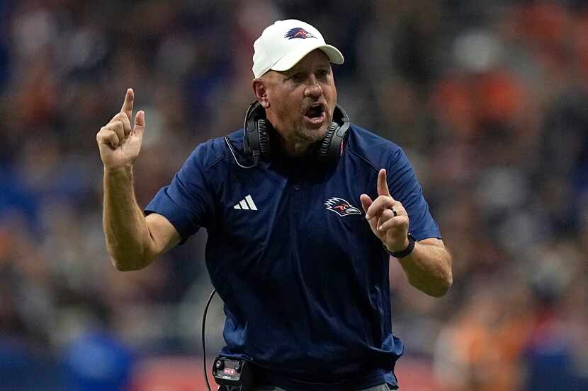UTSA head coach Jeff Traylor argues a call during the second half of an NCAA college...