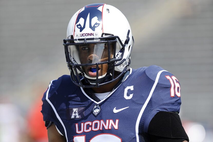 Connecticut cornerback Byron Jones (16) is seen during warmups before an NCAA college...