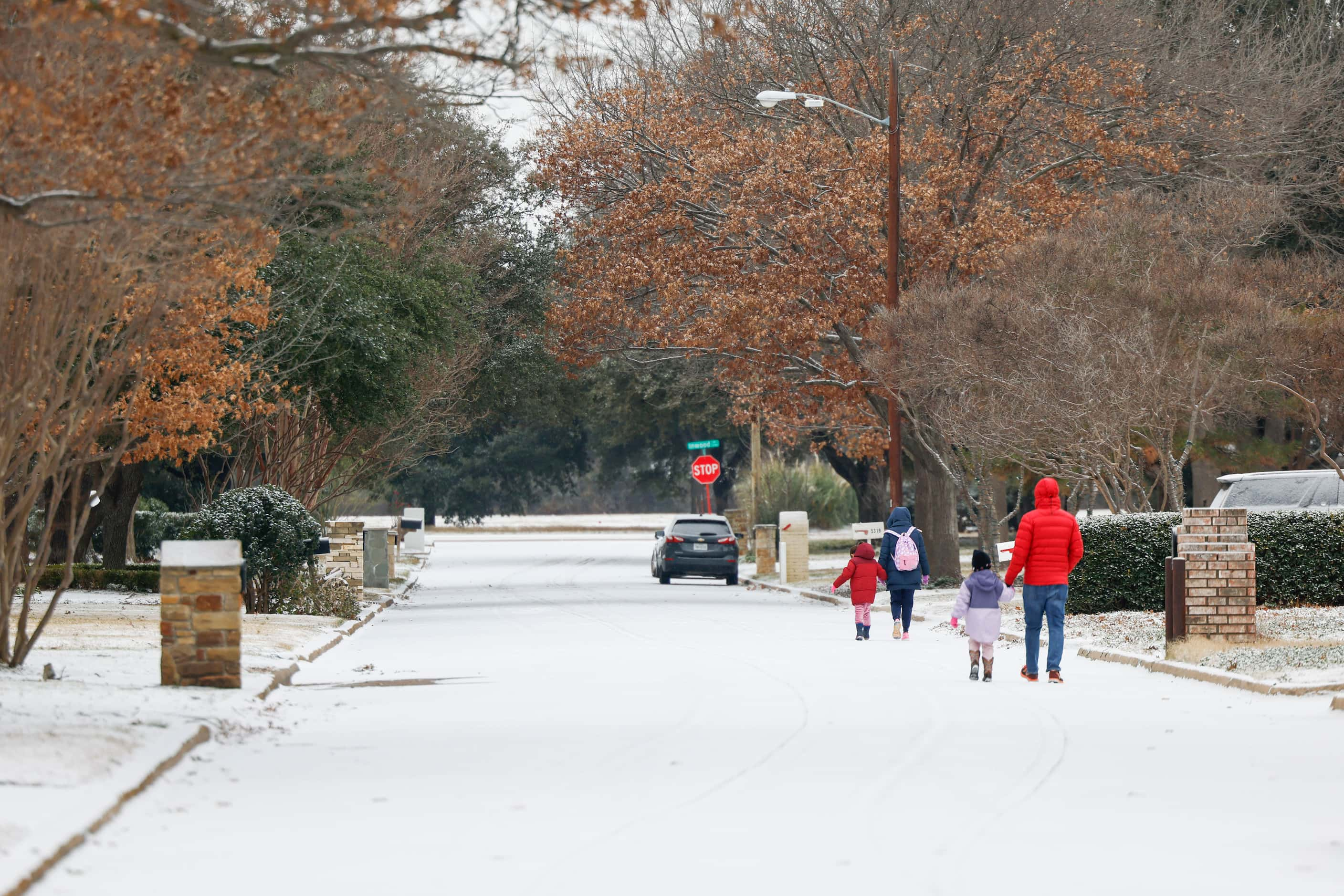 An icy mix covers a subdivision on Monday, Jan. 15, 2024 in North Dallas. 