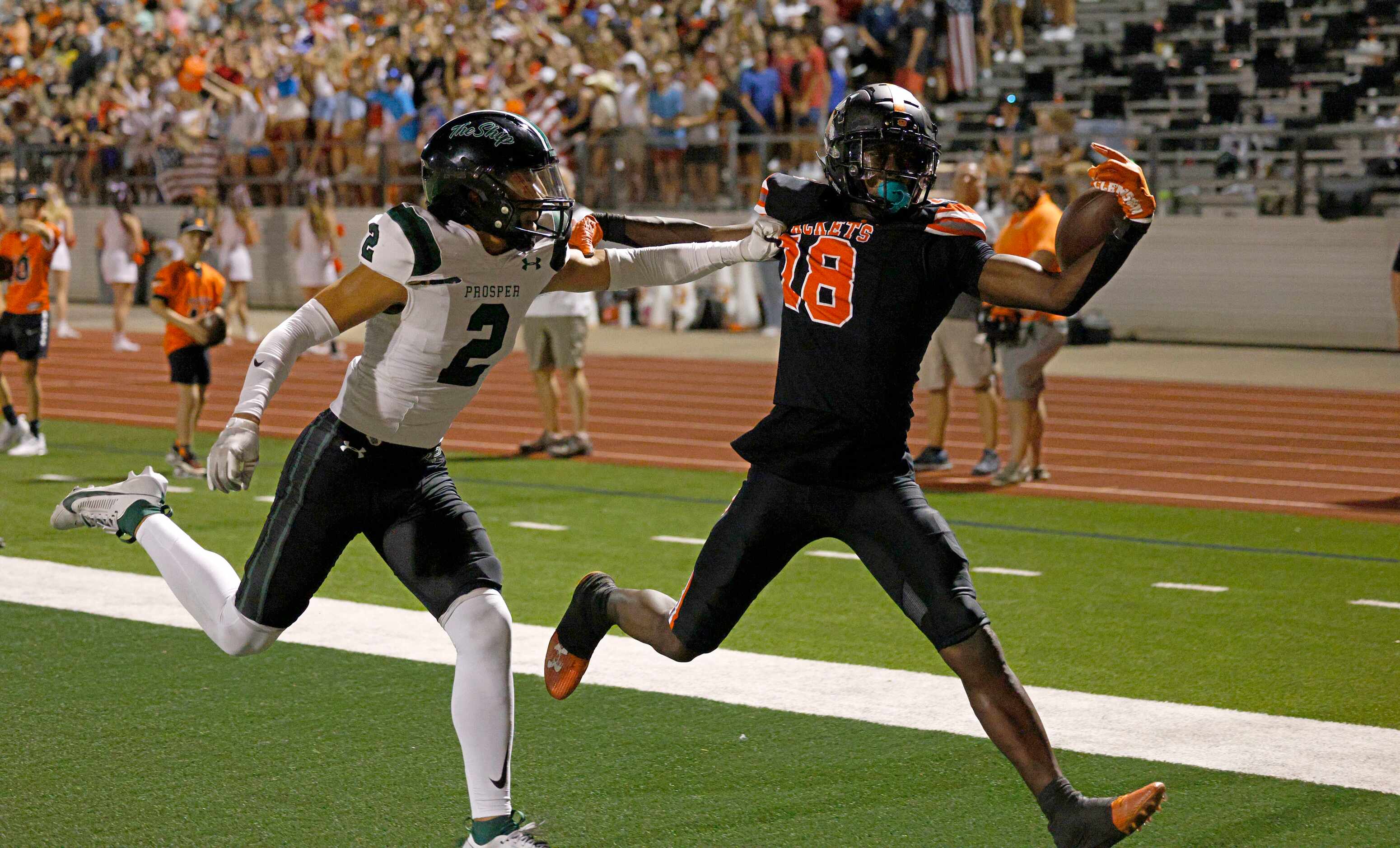 Rockwall's Matthew Young (18) fails to make the catch against Prosper's TJ Jones (2) during...