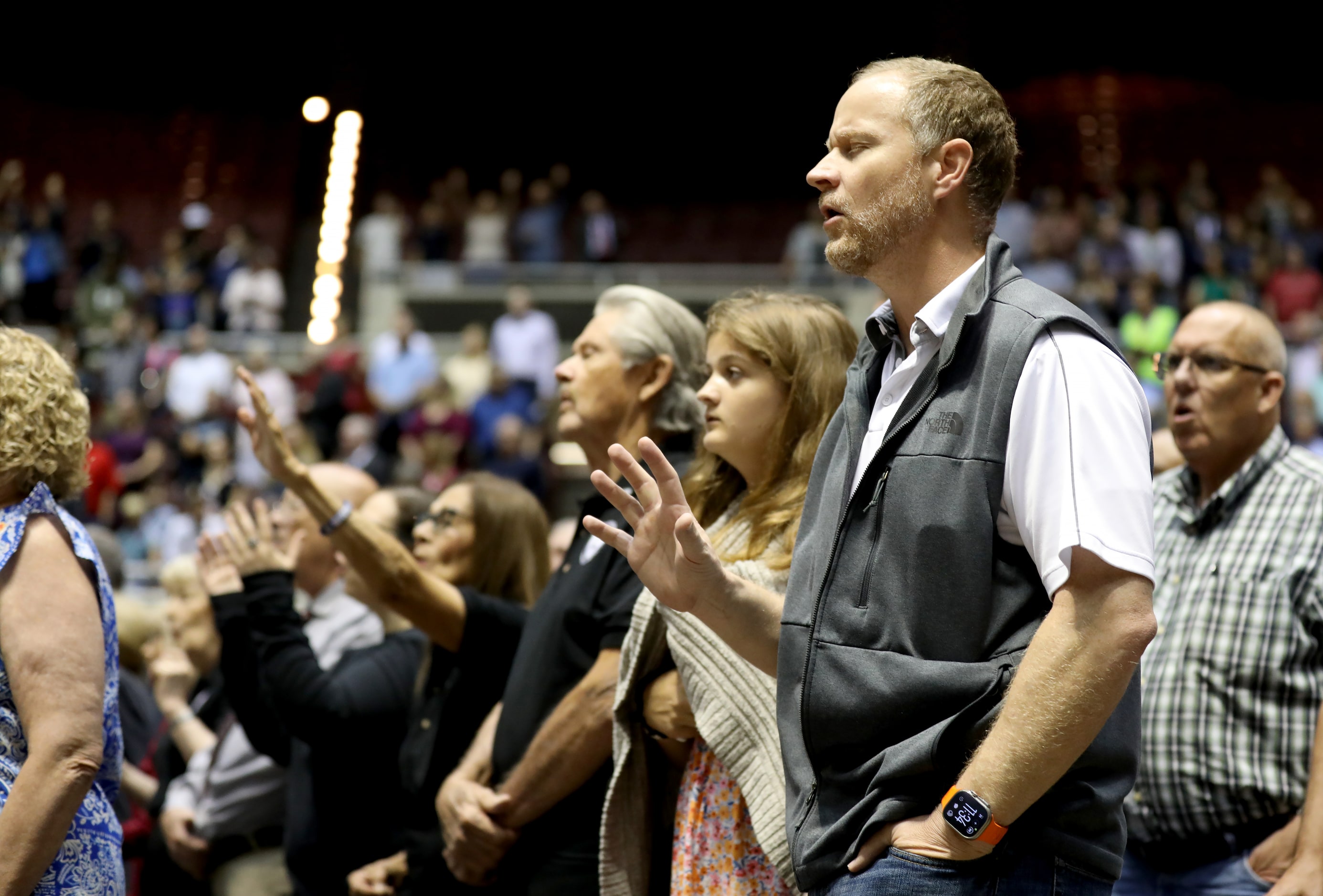 First Baptist Church members participate in Sunday service held at the Dallas Convention...