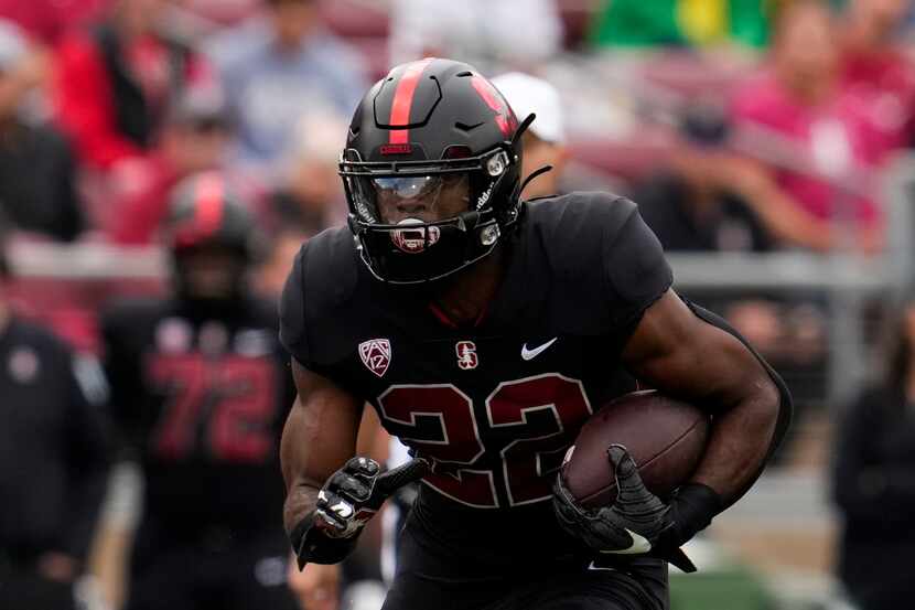 Stanford running back E.J. Smith runs the ball against Oregon during the first half of an...