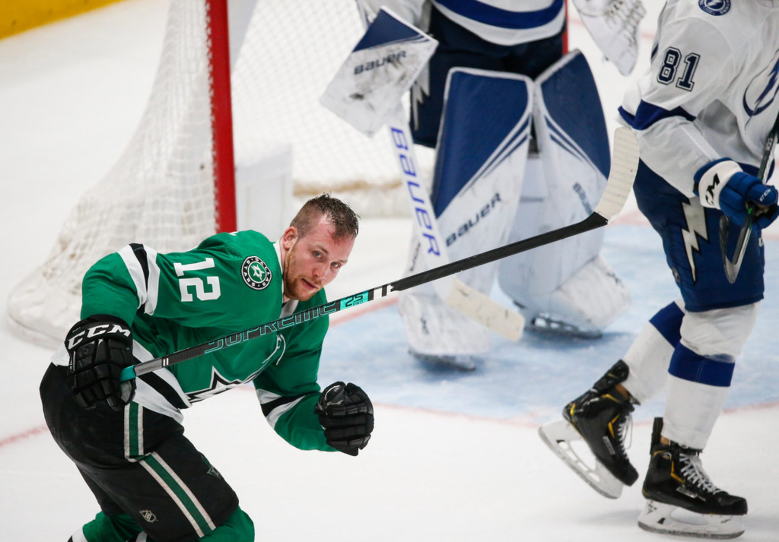 Dallas Stars center Radek Faksa (12) skates to the bench after losing his helmet during the...