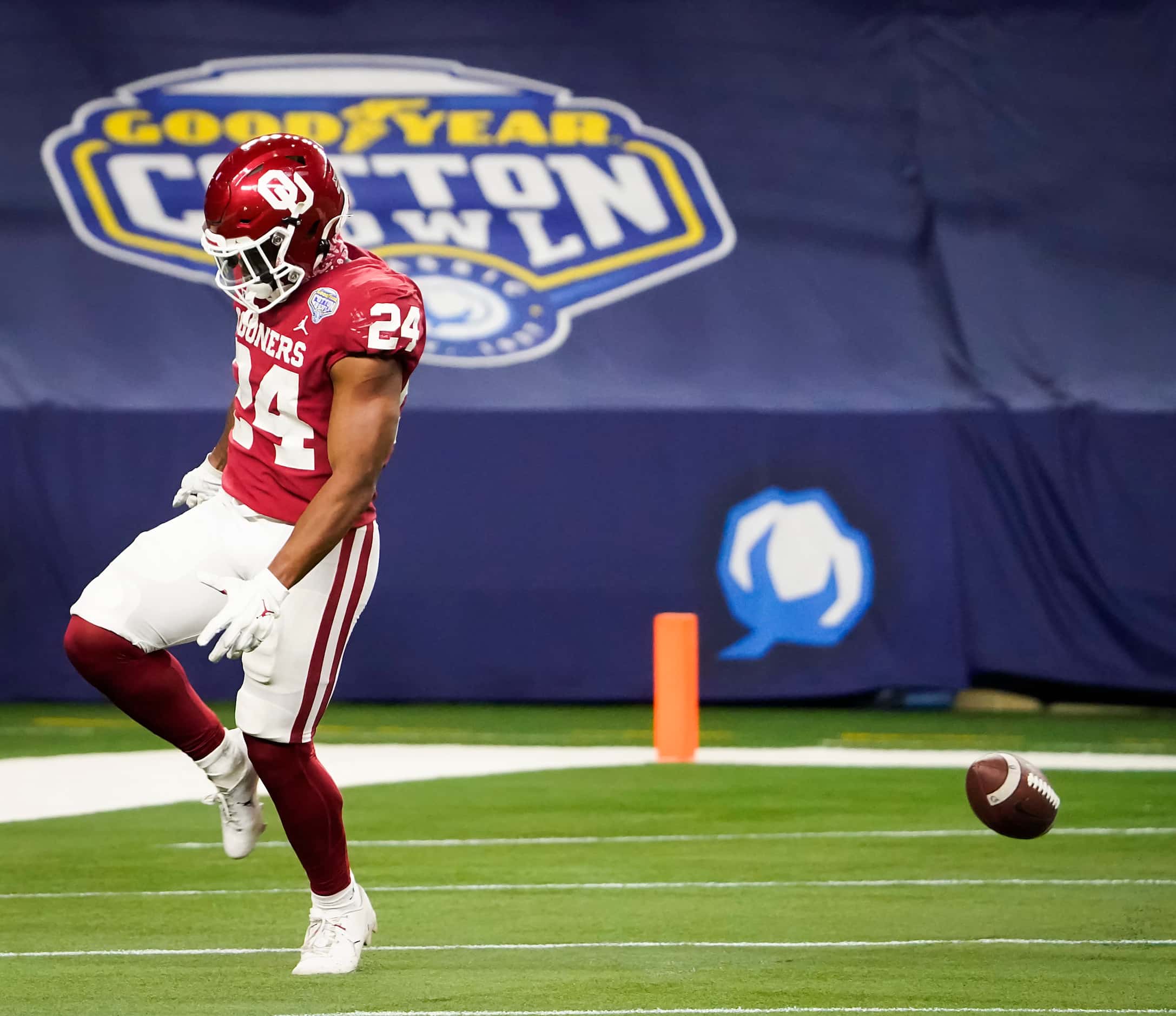 Oklahoma running back Marcus Major (24) celebrates after scoring on a 42-yard touchdown run...