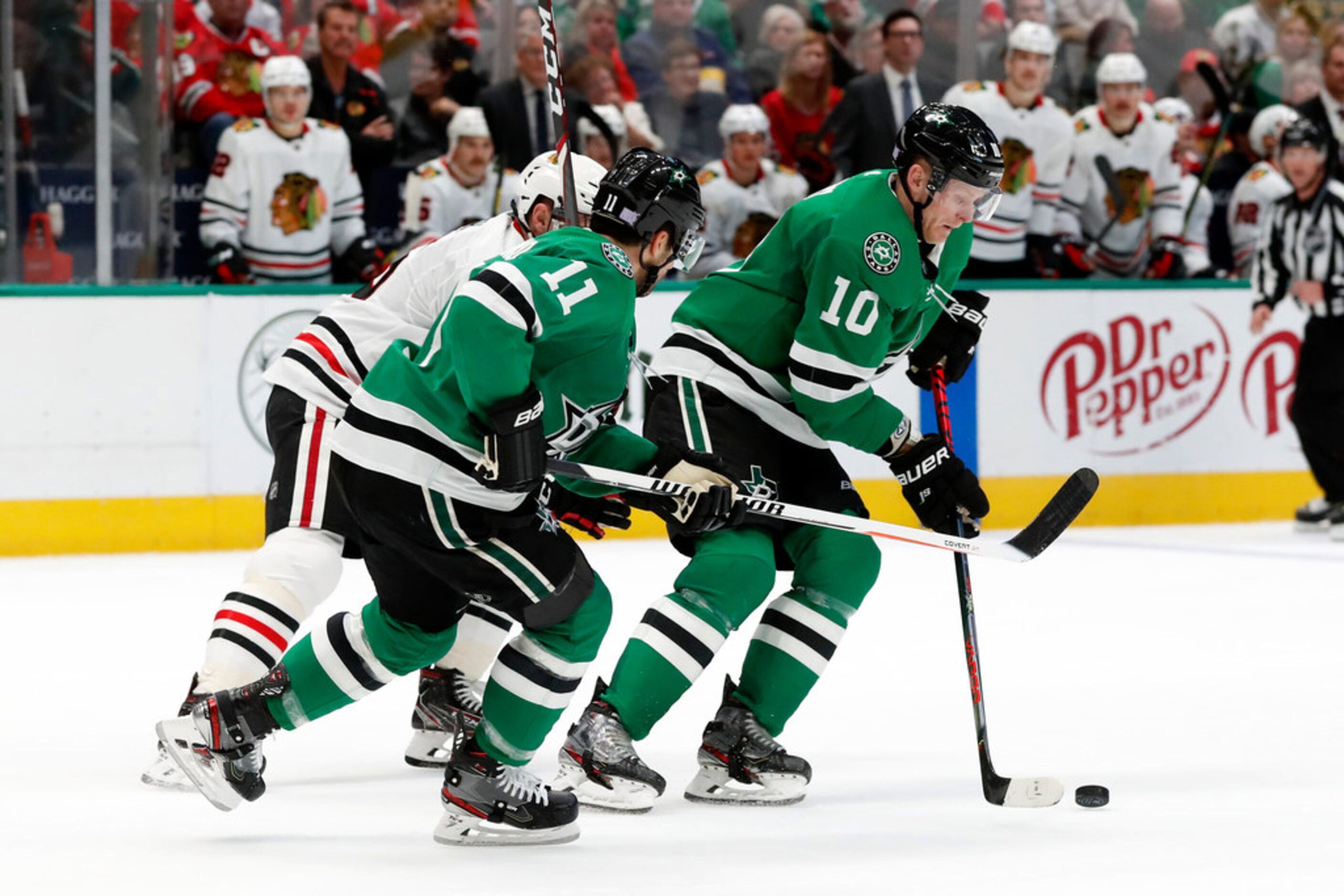 Dallas Stars right wing Corey Perry (10) and Dallas Stars center Andrew Cogliano (11) strip...