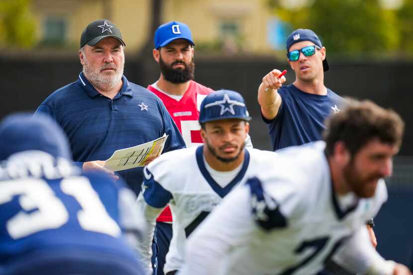 Dallas Cowboys head coach Mike McCarthy watches during a training camp walk-through on...