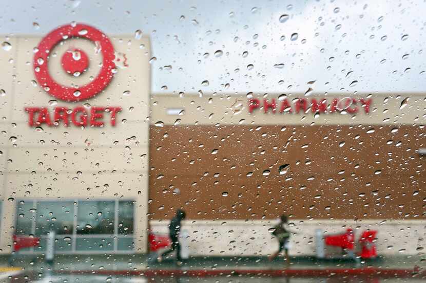 Shoppers left a Target store in Alhambra, Calif., on a rainy afternoon.