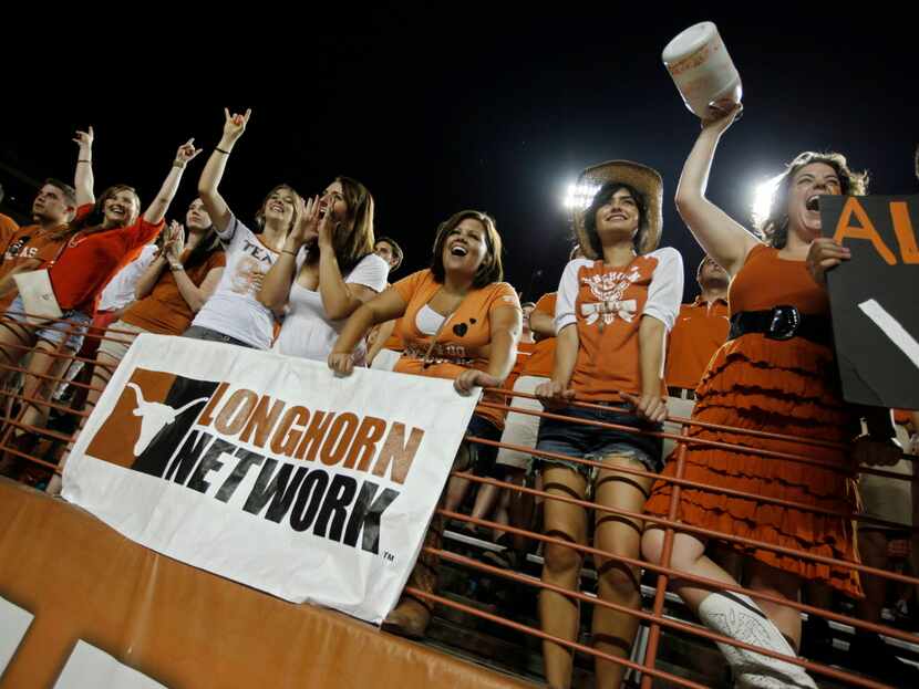 AUSTIN, TX - SEPTEMBER 3:  University of Texas fans cheer on the Longhorns as they play the...