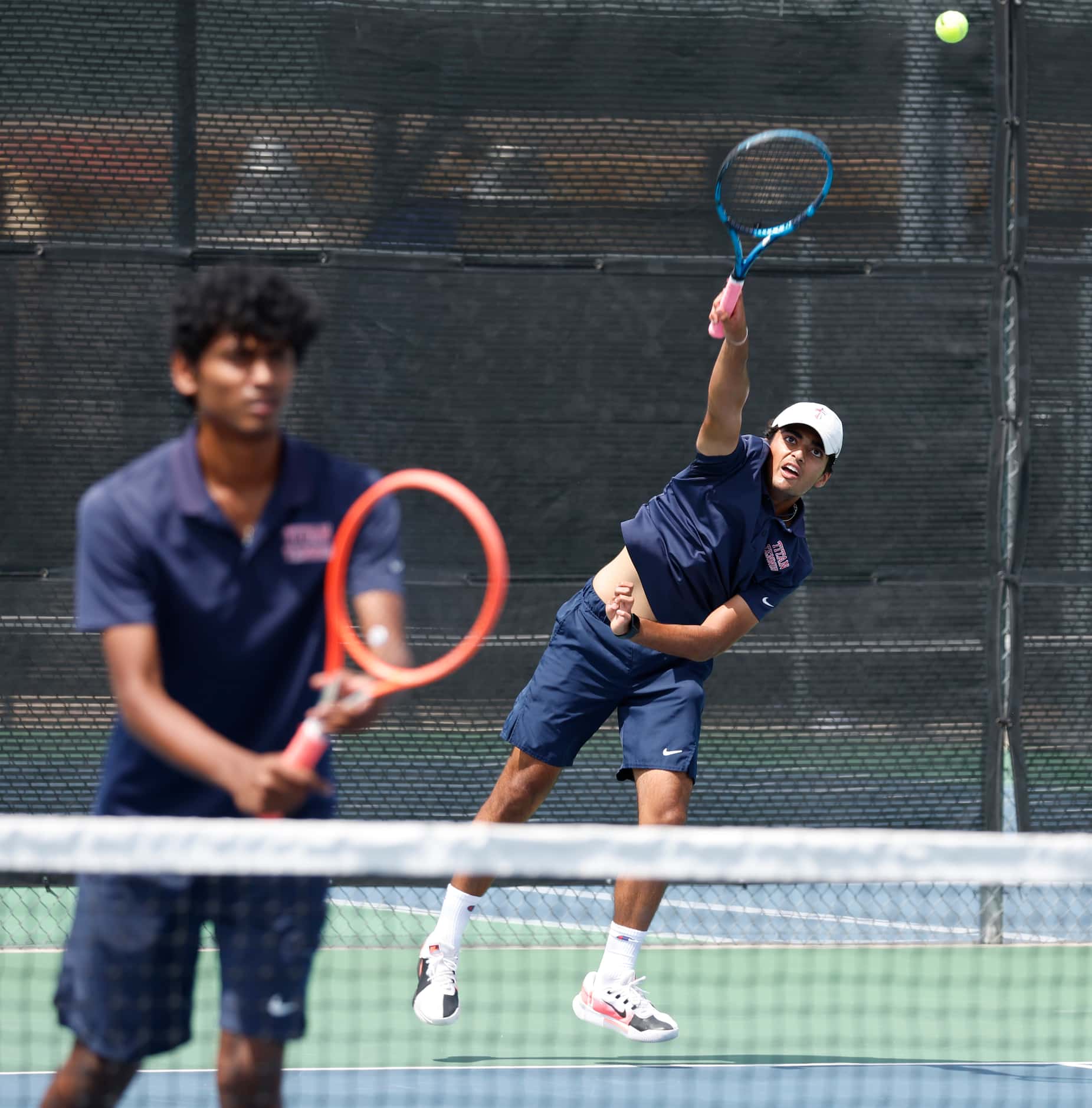 5A boys doubles final: Frisco Centennial's Aarav Sangan serves as teammate Shriyan...