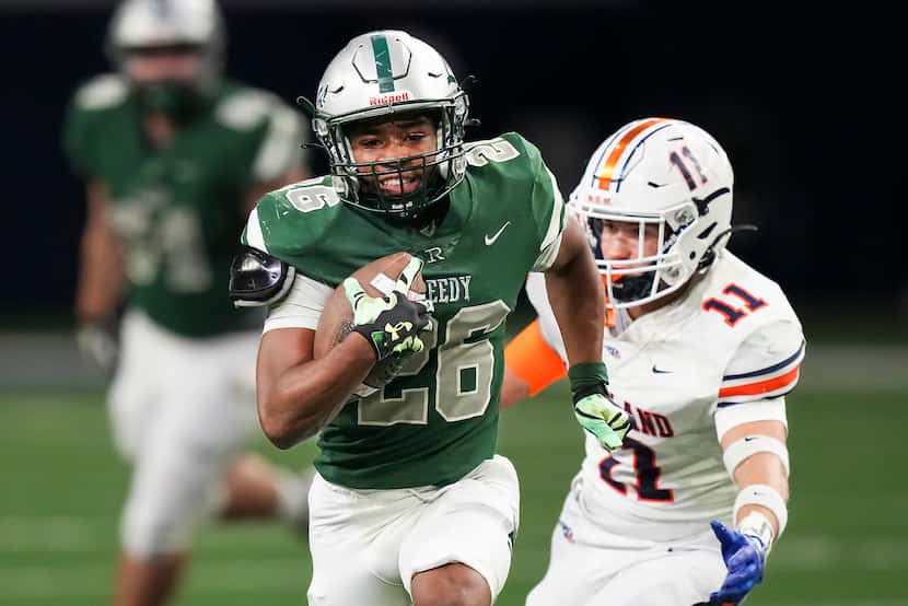 Frisco Reedy running back Triston Airy (26) races past Frisco Wakeland’s Campbell Martin...