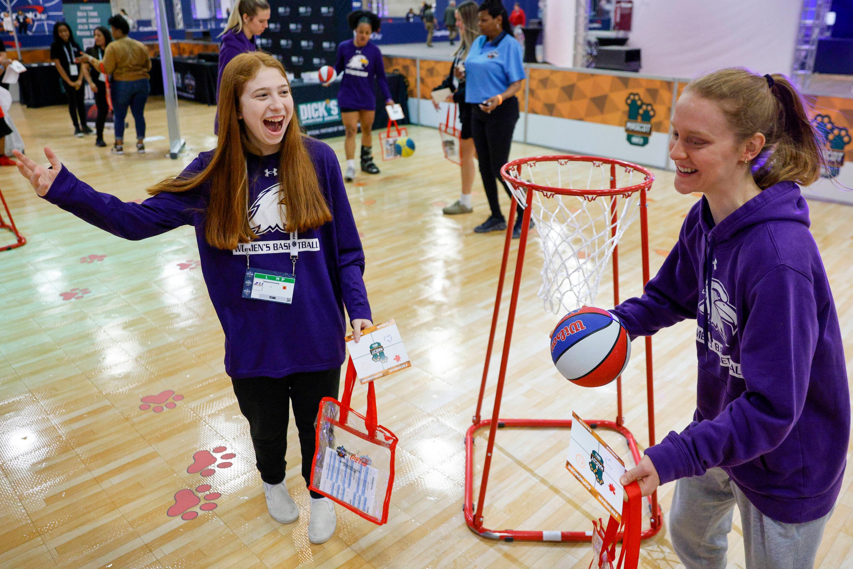 Ashland University team manager Maddie George reacts after having her shot blocked by...