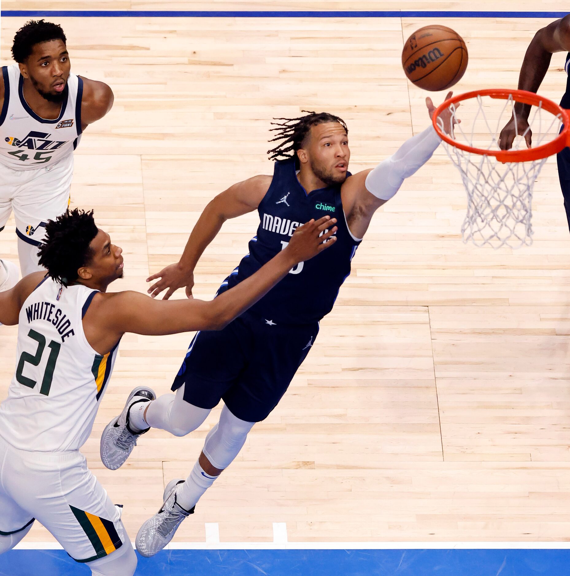 Dallas Mavericks guard Jalen Brunson (13) makes a running layup against Utah Jazz center...