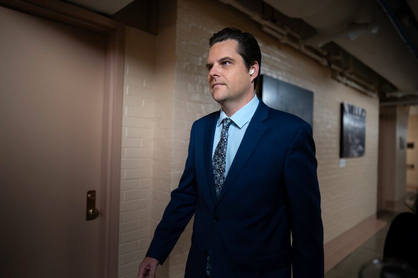 Rep. Matt Gaetz, R-Fla., walks through a basement corridor to a closed-door meeting with...