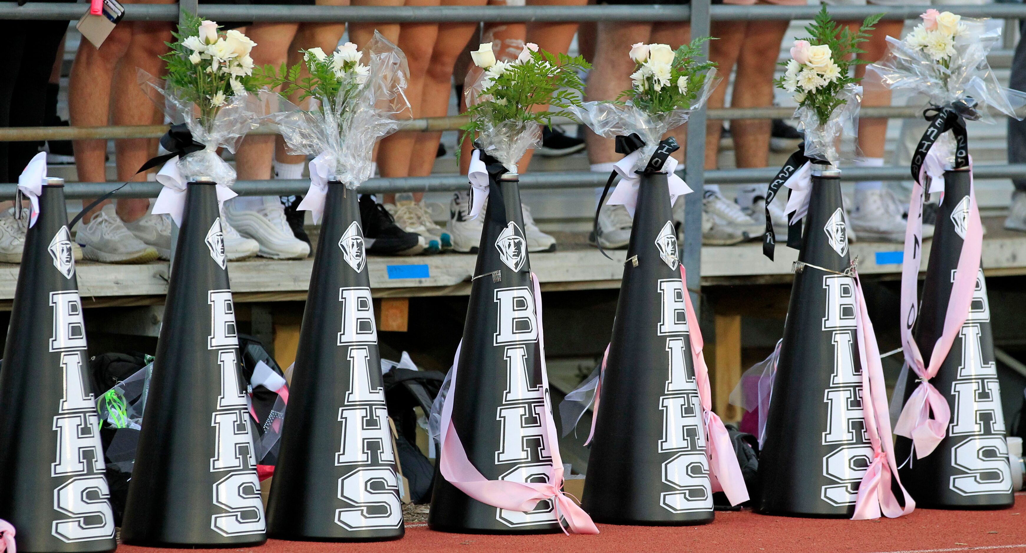 Decorated megaphones and flowers show it was Senior Night before the start of a high school...