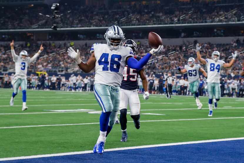 Cowboys running back Jordan Chunn (46) celebrates a touchdown during the third quarter of a...
