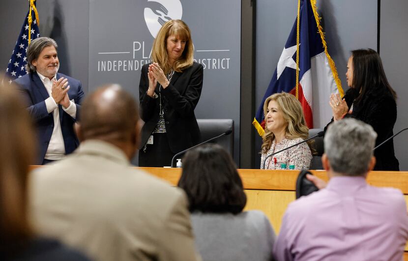 From left, president of Plano ISD David Stole, superintendent Sara Bonser, and board member...